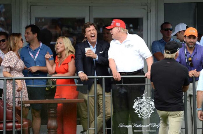 Bedminster,nj-july,31,2022:,Tucker,Carlson,(c),Jokes,With,Former,President,Trump