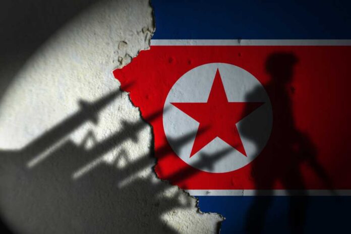 Shadows,Of,North,Korean,Missiles,And,Soldiers,On,The,Wall.