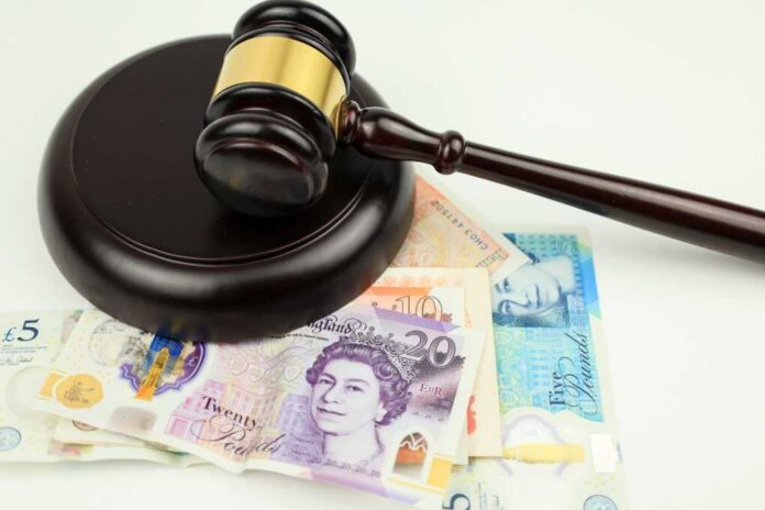 Justice,Gavel,Next,To,Sterling,Pound,Bills,On,White,Background.