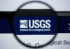 USGS logo viewed through a magnifying glass