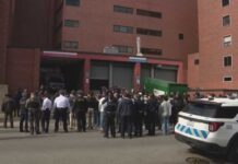 Handcuffed Suspect SHOOTS TWO Cops Inside Hospital