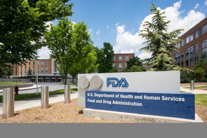 Exterior view of the FDA building with signage and trees