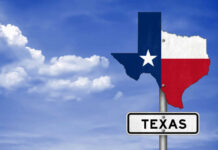 Texas state outline with flag colors and a road sign indicating Texas