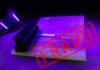 Massive Welfare Fraud Uncovered in Boston A passport under UV light with a stamp indicating fraud