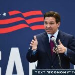 GOP’s Risky Map Strategy — Unprecedented Deviation? A politician delivering a speech at a podium with a microphone