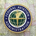 Federal Aviation Administration logo on a vintage map background