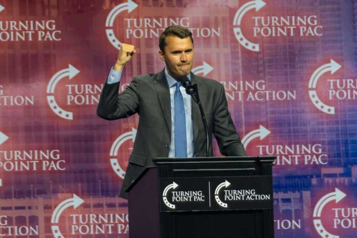Speaker at a podium delivering a political speech