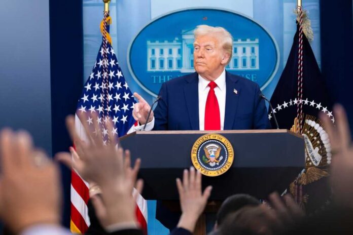 A political leader addressing the media at a press conference