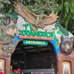 Entrance to ZooAmerica featuring animal sculptures and signage