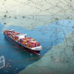 A cargo ship navigating through water with digital security elements overlayed