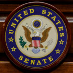 Official seal of the United States Senate featuring an eagle and stars