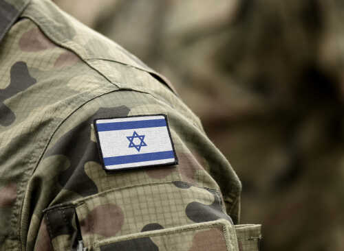 Flag,Of,Israel,On,Military,Uniform.,(collage). Close-up of a military uniform with an Israeli flag patch