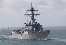 Senator Blasts Slow Rollout of Robot Warships A naval destroyer sailing in the ocean