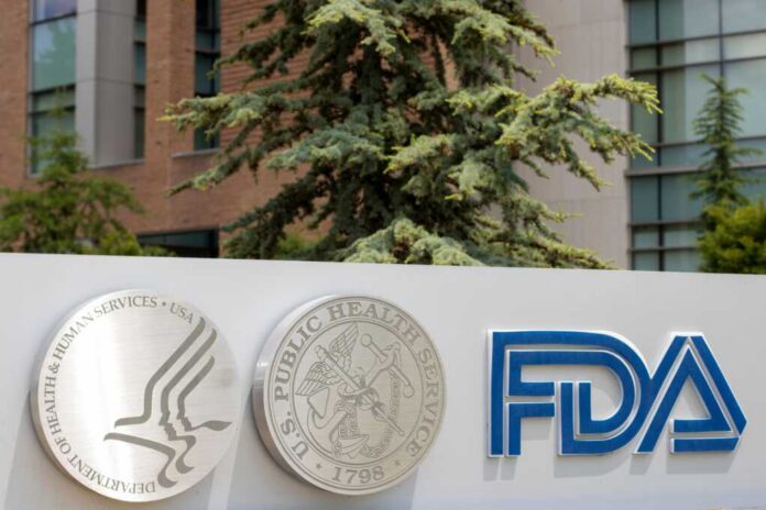 Signage featuring the FDA logo and symbols of health services