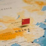 Map of China with a small Chinese flag placed on it