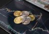 Fentanyl Money Launderers EXPOSED — Treasury Strikes Hard Various cryptocurrency coins on a digital trading chart