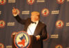 Donald Trump delivering a speech at a Republican event