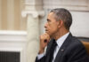 Obama, Ukraine, And The Missing Answers A political figure in a formal setting, deep in thought
