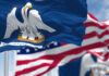 Incumbent Ousted: Chaos Rocks GOP Close-up of the Louisiana state flag with an American flag in the background