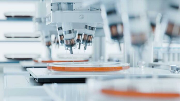 Futuristic,Laboratory.,High,Precision,Research,Equipment,Conducting,Experiments.,Bioprinting,Advanced Automated laboratory equipment with robotic arms dispensing liquids into petri dishes