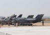 NATO Could Lose Key U.S. Forces F-35 military jets parked on an airfield with crew members nearby