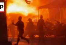 Blocked Exits Fuel Tragic Fire Huge fire at a Bangkok beer hall kills at least 27