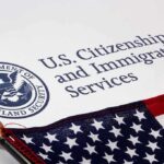 U.S. Citizenship and Immigration Services document with American flag