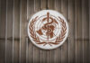 Ebola Crisis Spreads Beyond Congo World Health Organization emblem featuring a globe and caduceus