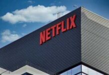 Netflix Revenue Beats, Stock Slides Close-up of the Netflix logo on a modern building