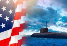 America’s Fleet Plan Enters New Phase Submarine at sea beside a partial American flag