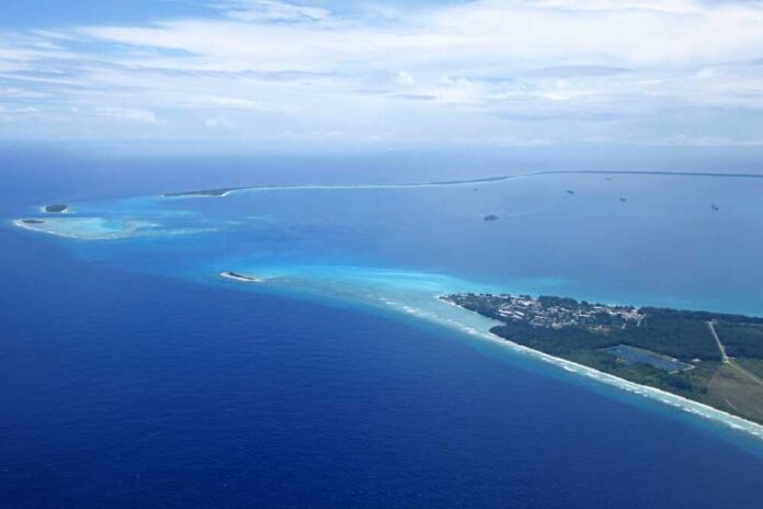 Aerial,Photo,Of,Diego,Garcia Aerial view of a tropical island surrounded by blue ocean waters