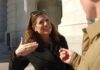 Congresswoman Eyes Graham’s Senate Seat Woman being interviewed outside a stone building