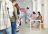 Paperwork Trap Looms Under Trump’s SAVE Act People waiting in line at a polling station to cast their votes