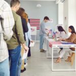 Paperwork Trap Looms Under Trump’s SAVE Act People waiting in line at a polling station to cast their votes