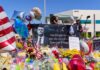 Charlie Kirk Murder Hearing Draws National Focus A memorial site with flowers, balloons, and a large photo honoring Charlie