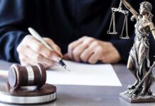 Epstein-Style Deal Shadows Texas Power Judge writing at desk with gavel and Lady Justice statue