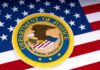 GOP Civil War Erupts Over DOJ Control Department of Justice seal on American flag background