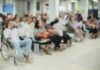 Big Pharma Strangles Rural Hospitals Crowd of people waiting in a hospital waiting area