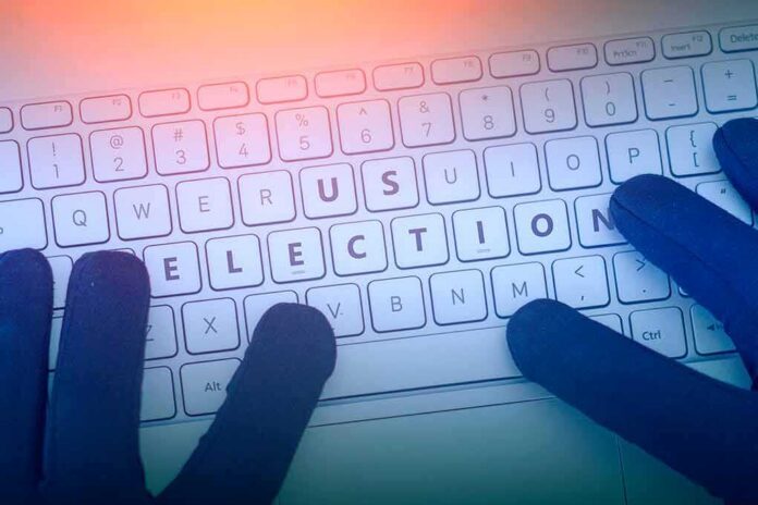 shutterstock_1161561025 Gloved hands typing on a keyboard with highlighted election keys