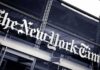 NYT Nailed In Defamation Trial — Huge Payout The New York Times sign on a glass building facade