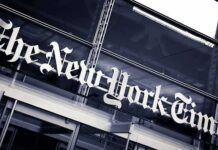 NYT Nailed In Defamation Trial — Huge Payout The New York Times sign on a glass building facade