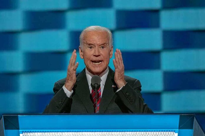 shutterstock_1362500387 elderly man in suit speaking at a podium