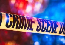 Benadryl Death Plot Shocks Investigators Crime scene tape with blurred emergency lights in background
