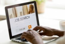 Millions of Jobs, One Sector Dominates Hands typing on laptop with job search website open