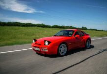 New Tire Rules Threaten Wallets Red sports car driving on a rural highway