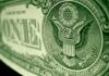 Global Scam Compounds Raided – Billions Frozen Great Seal eagle on U.S. one-dollar bill