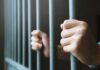 Upper East Side Turns BLOODY hands gripping prison bars