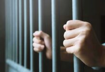 Upper East Side Turns BLOODY hands gripping prison bars