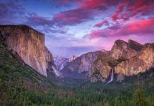 Star Athlete’s Fall Stuns Campus Granite cliffs and waterfall at sunset in a forested valley