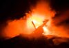 L.A. Crash Sparks Federal Scrutiny Toy helicopter silhouette against fiery explosion at night